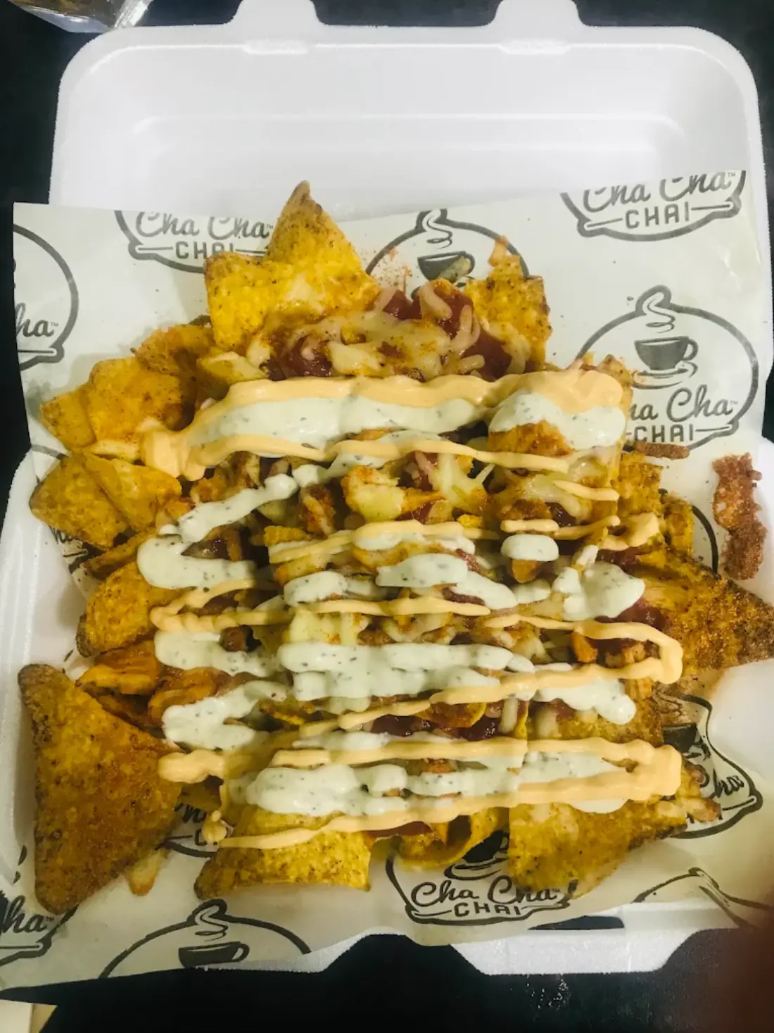Loaded chips in a branded takeaway box